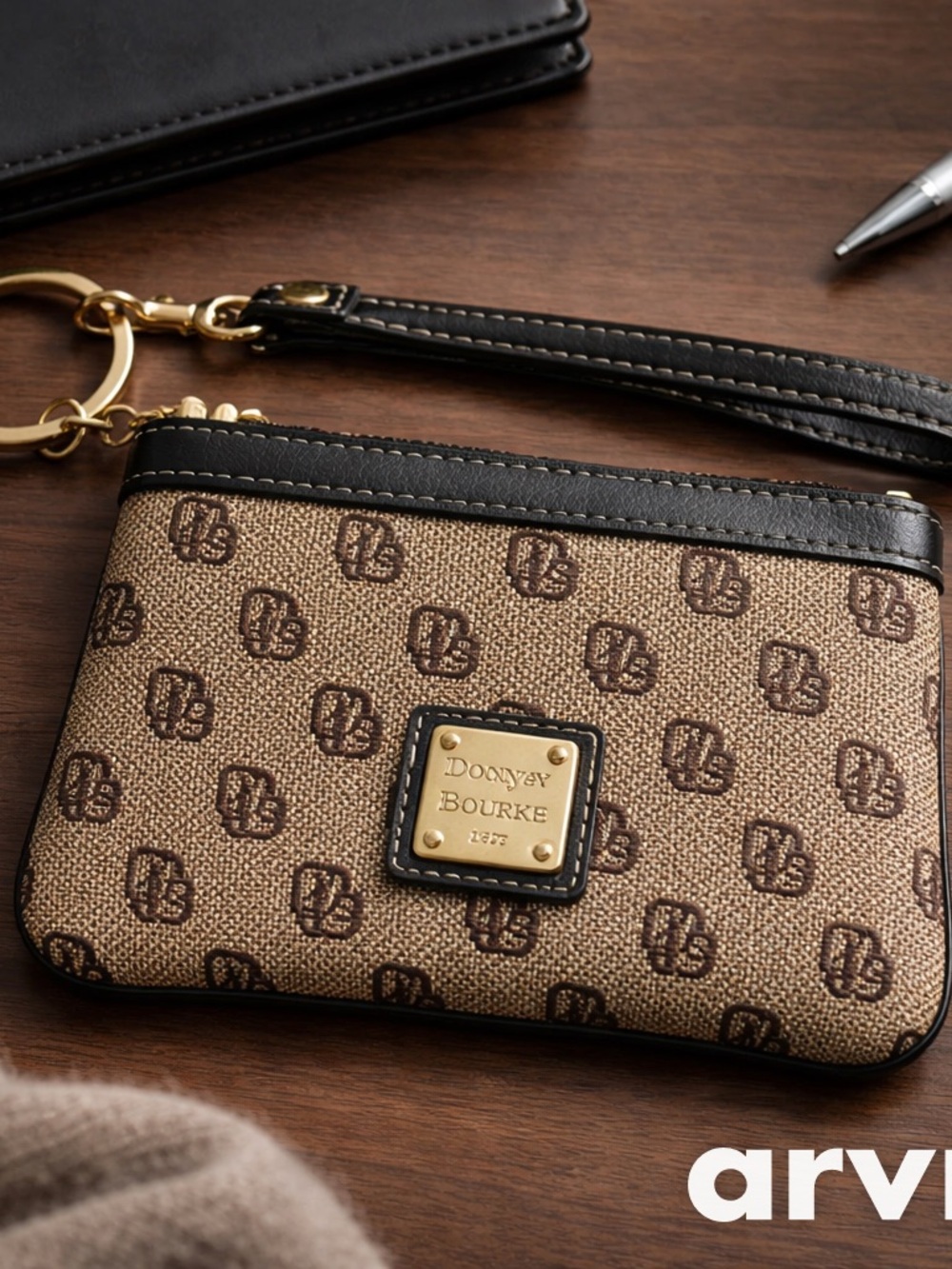 Dooney & Bourke Black and Tan Signature Wristlet Clutch